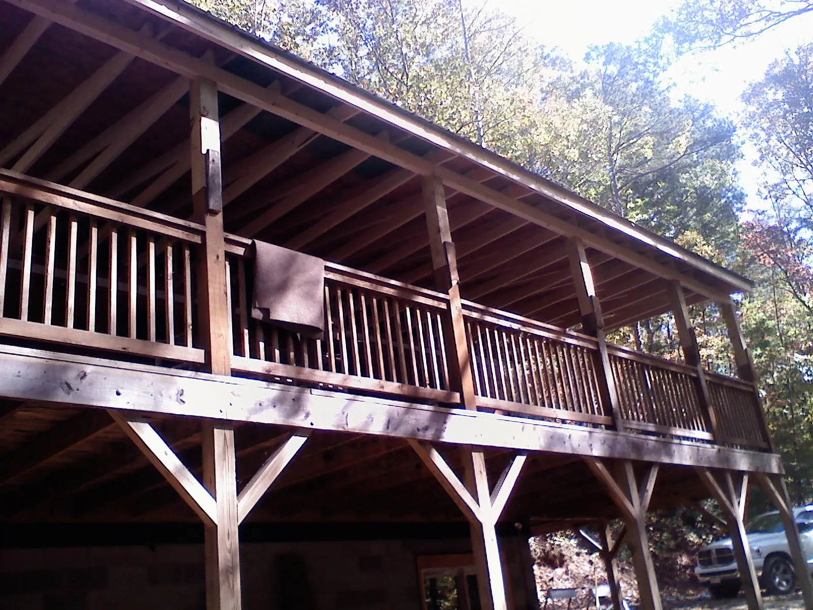 Timber framing under a new elevated porch and deck — Roof Leak Repair in Jud by Roofing Brothers